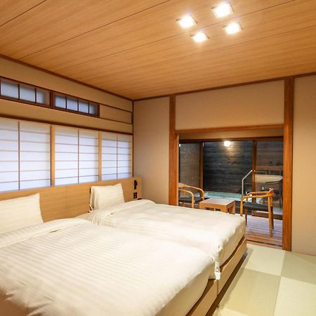 源泉掛け流しの宿albergo湯楽 Yugawara Esterno foto